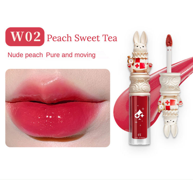 Lip gloss with rabbit design and 'Peach Sweet Tea' color swatch on lips