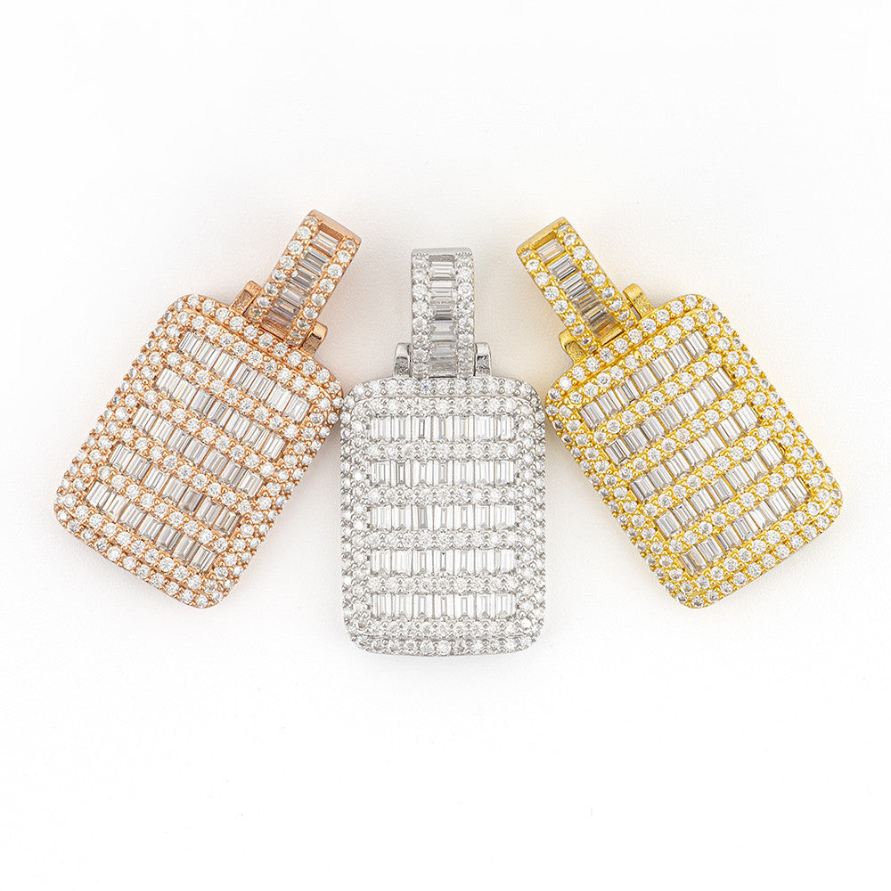 Three diamond-encrusted pendants in rose gold, silver, and yellow gold on a white background.