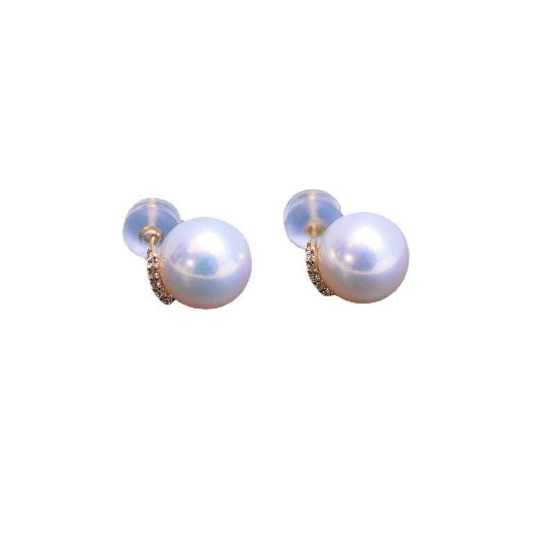 Pair of pearl earrings on a white background