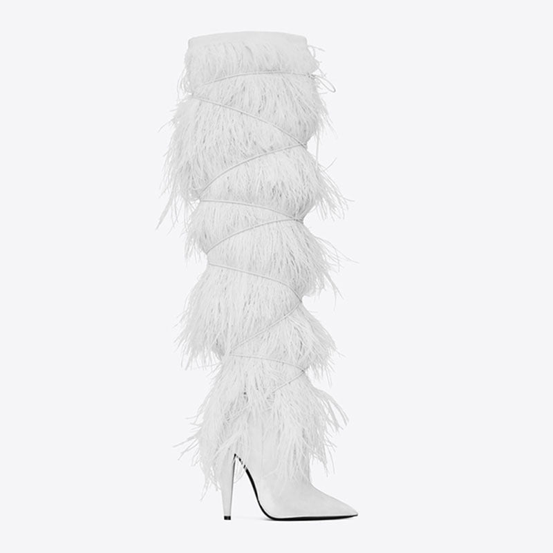 White feathered knee-high boots on a white background