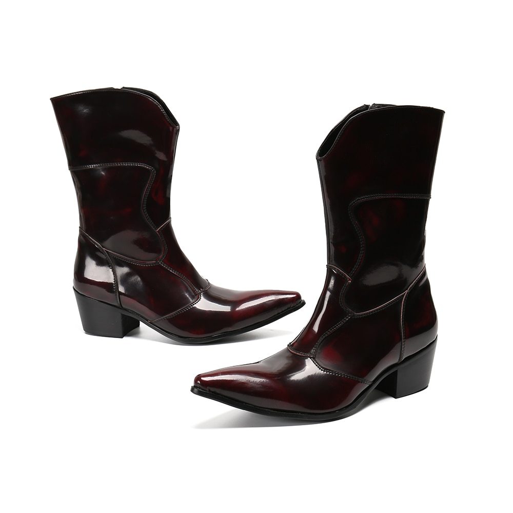 Pair of dark red patent leather boots on a white background
