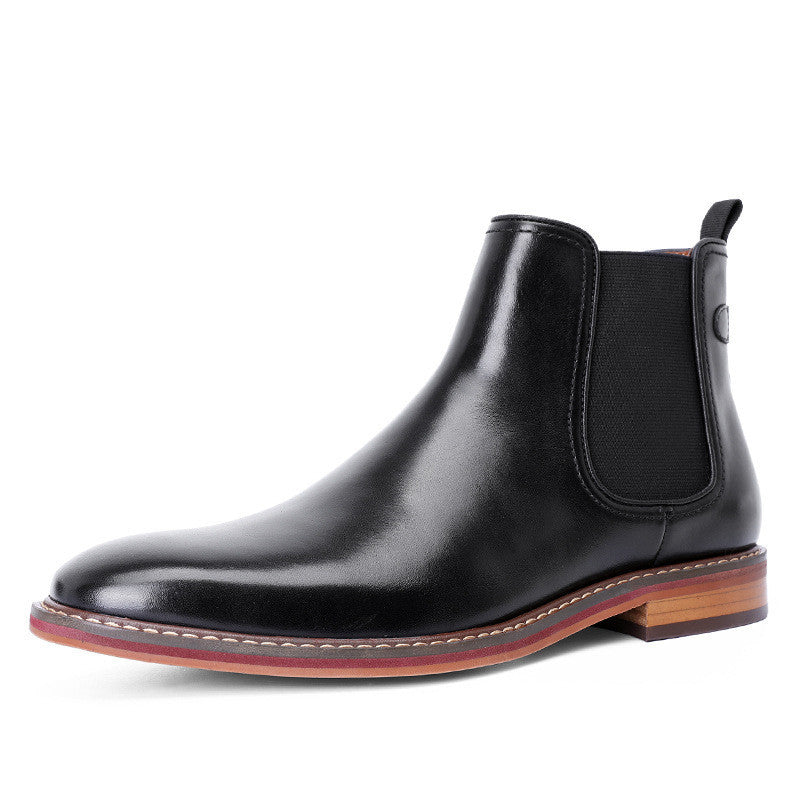 Black leather Chelsea boot on a white background