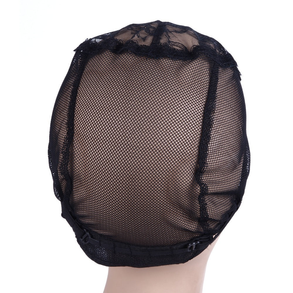 Black mesh wig cap on a mannequin head against a white background