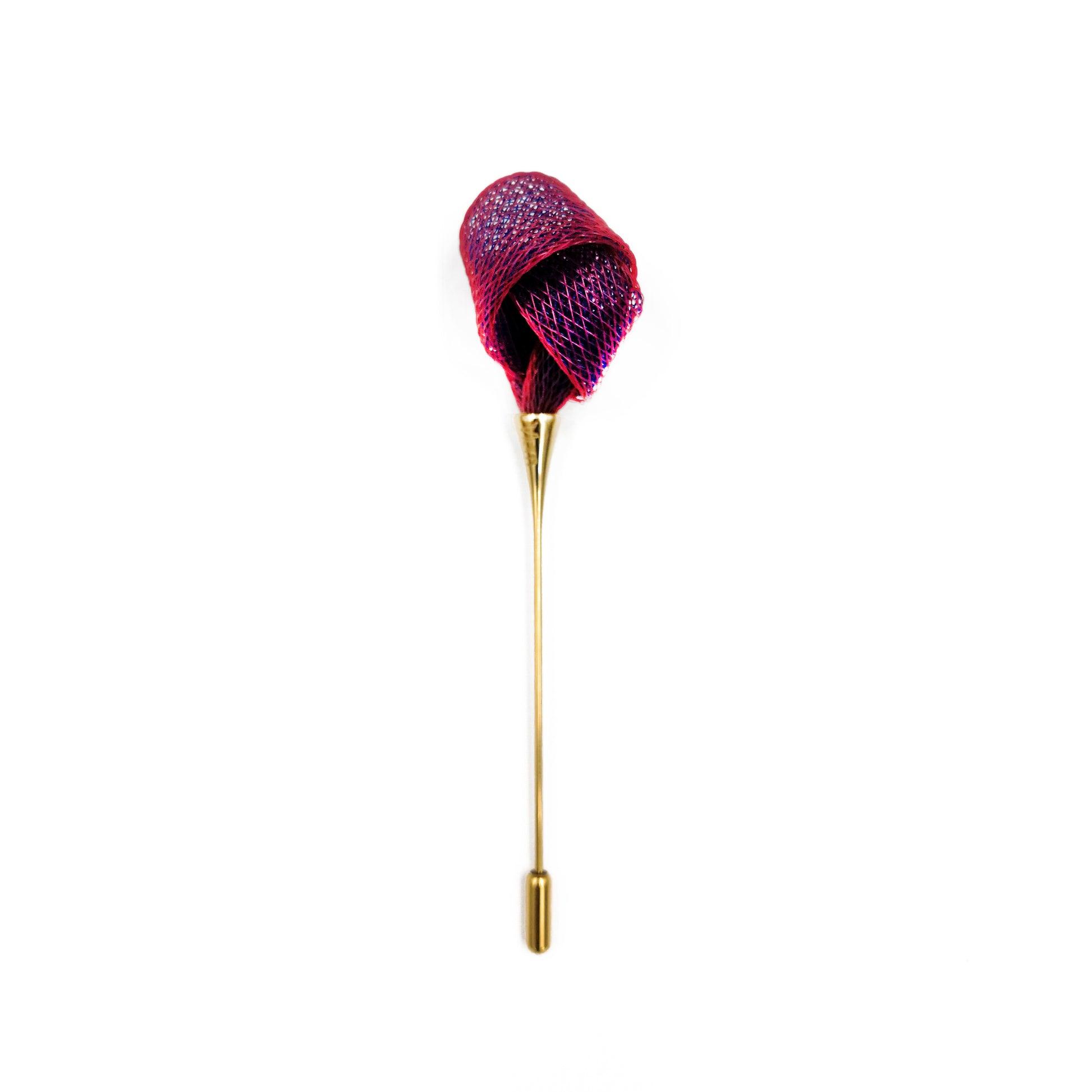 Red floral lapel pin on a white background