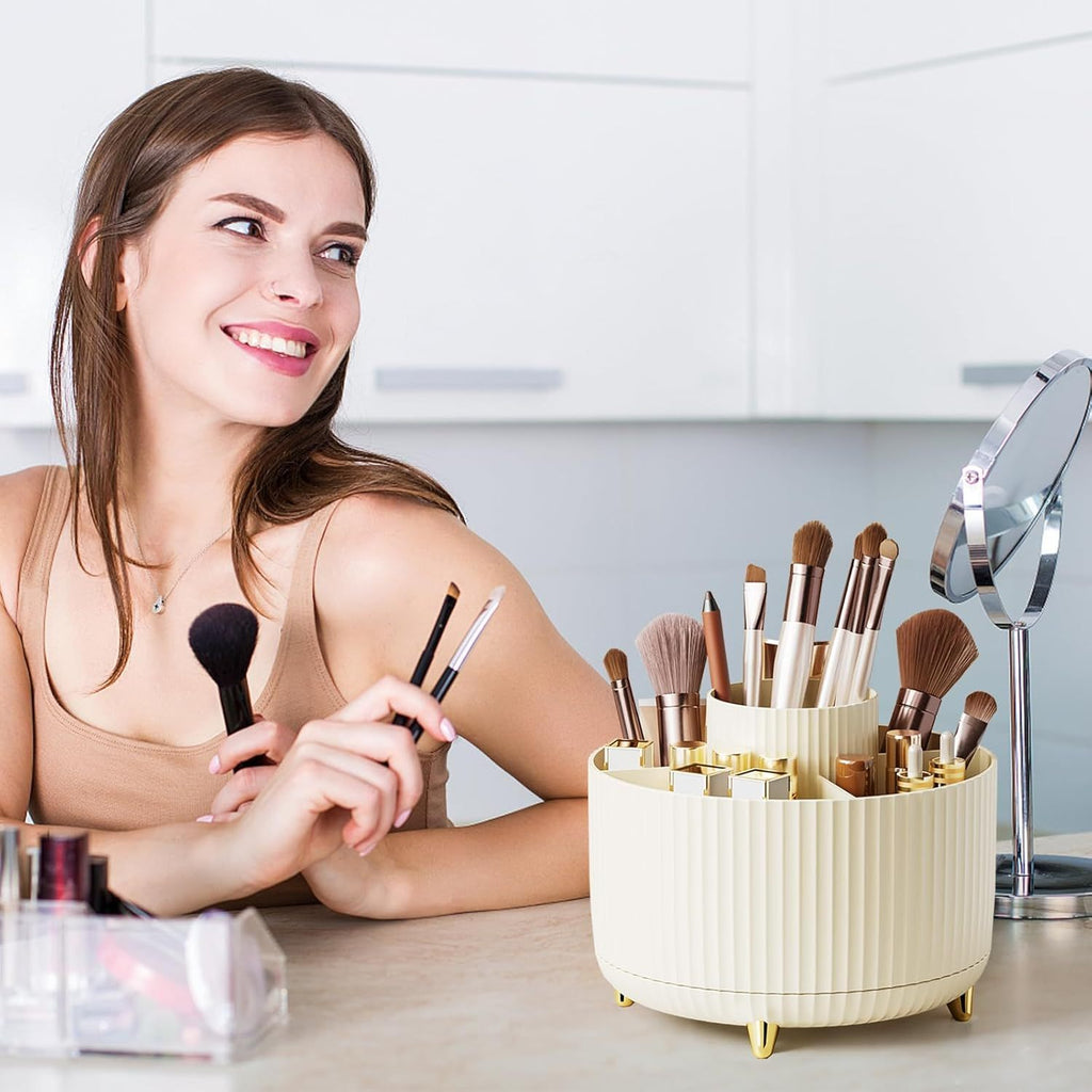 Woman with makeup brushes in a holder on a table