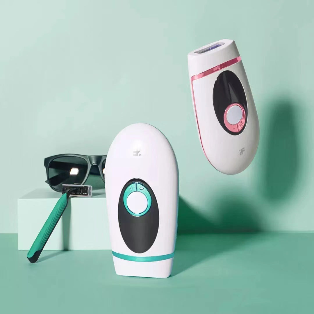 Two white electronic devices with black and green accents on a light green background