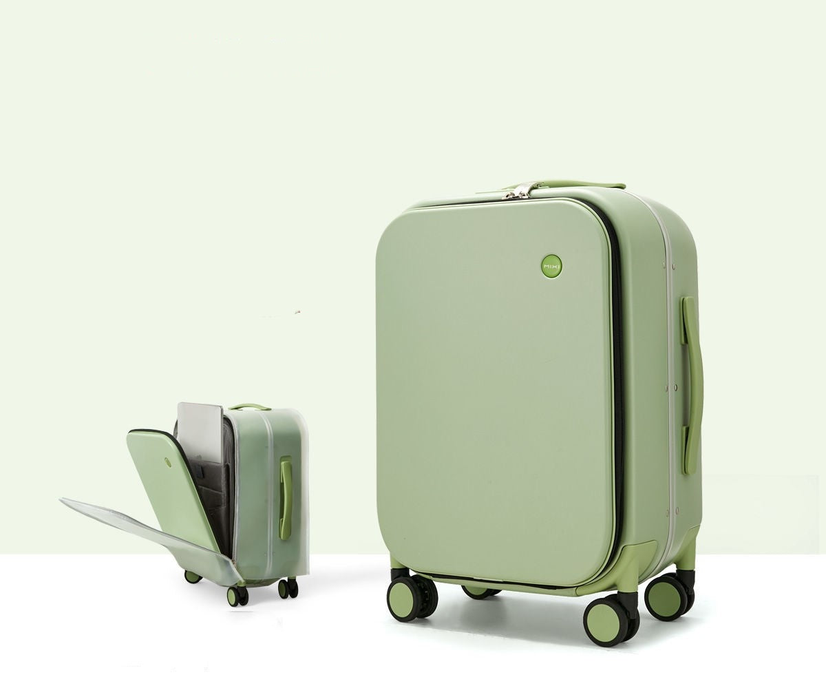 Green suitcase with open front compartment on a white background