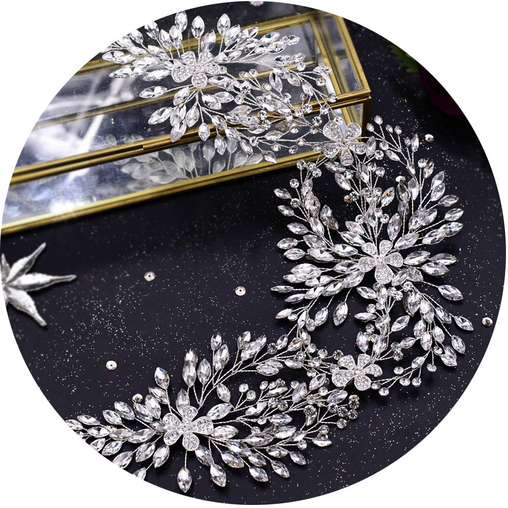 Decorative hair accessories with crystal details on a black background