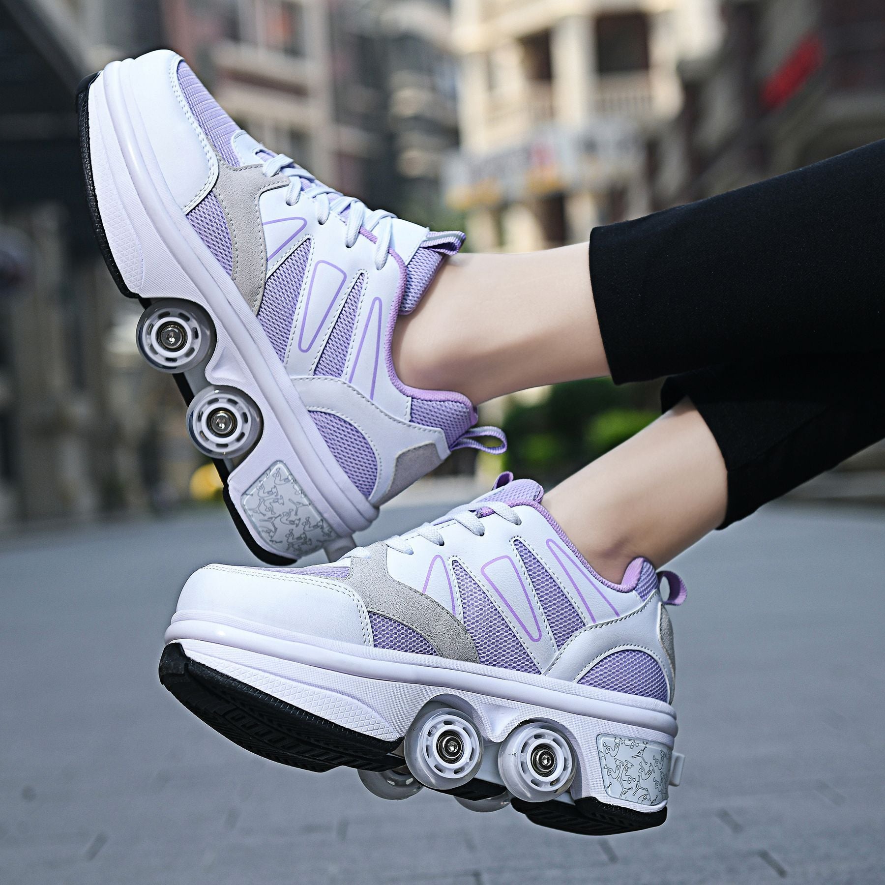 Purple and white roller shoes on a blurred city street background