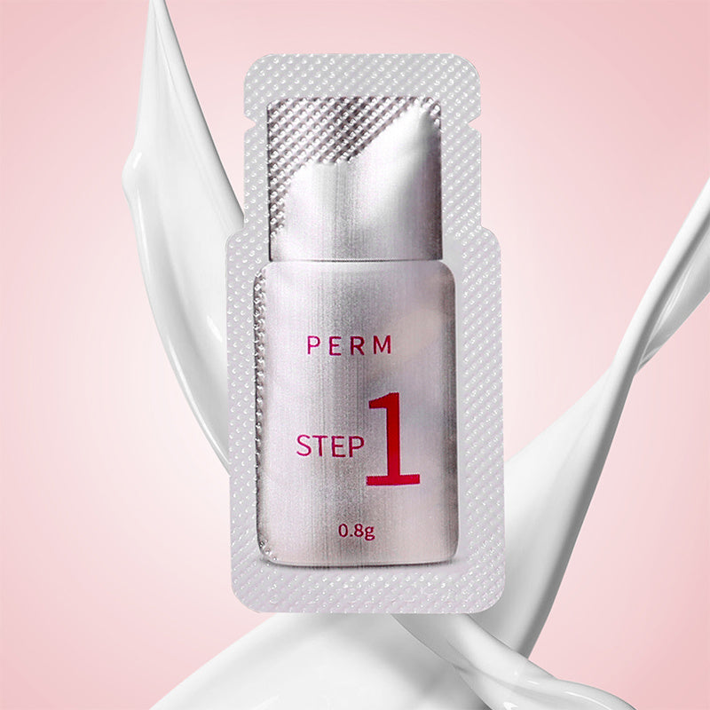 Perming solution packet with 'PERM STEP 1' on a pink background