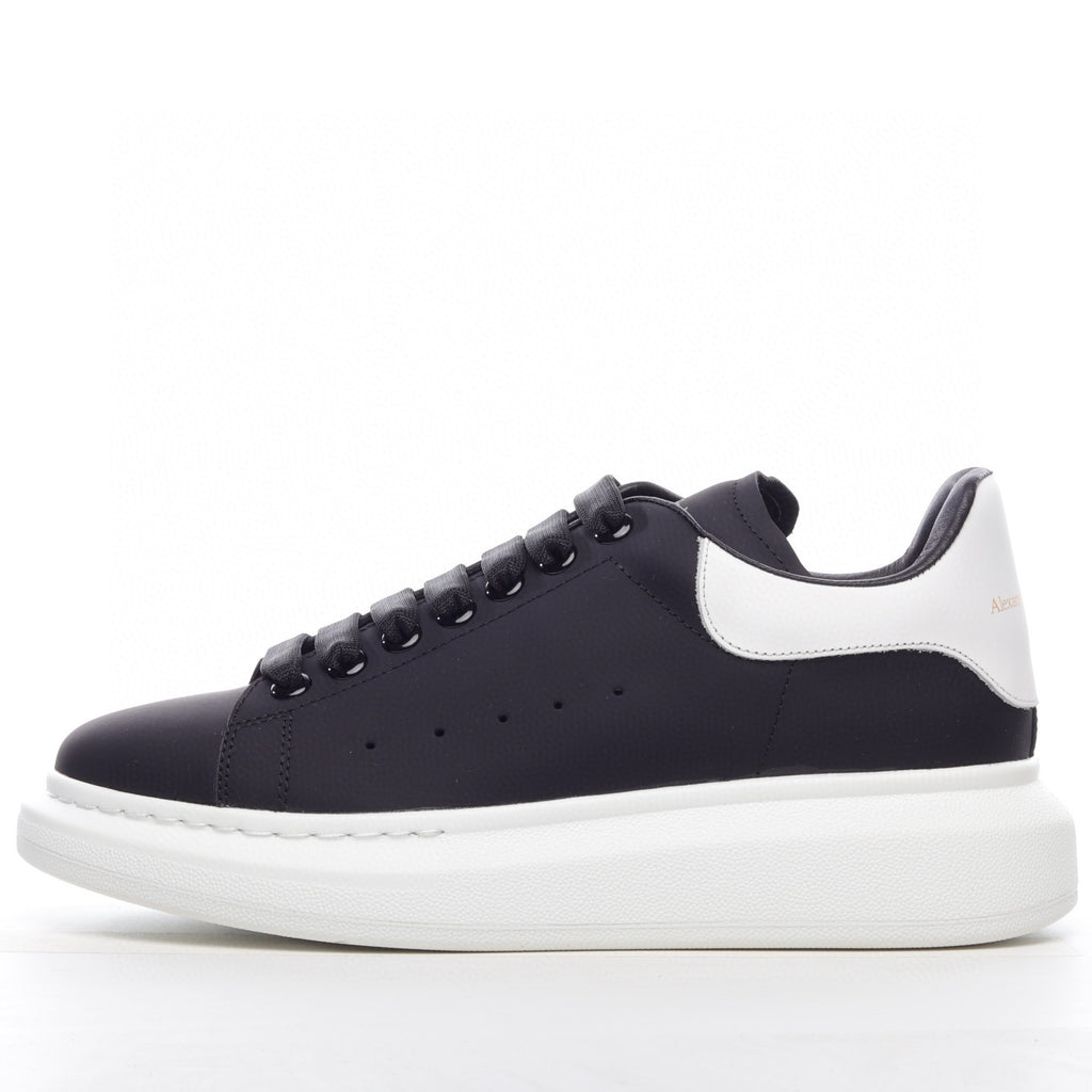 Navy and white sneaker on a white background