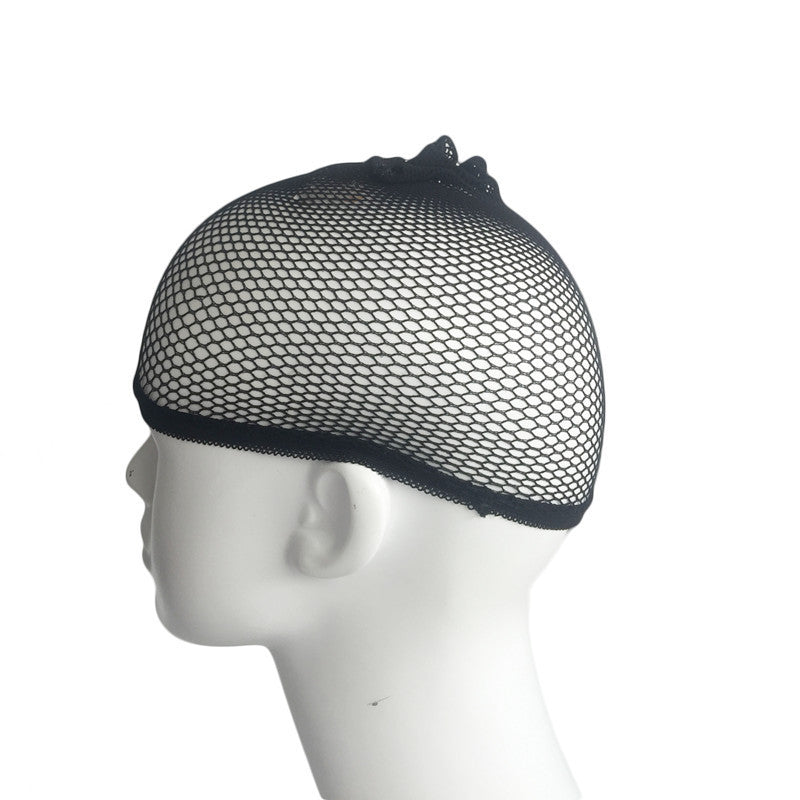 Black fishnet cap on a mannequin head against a white background