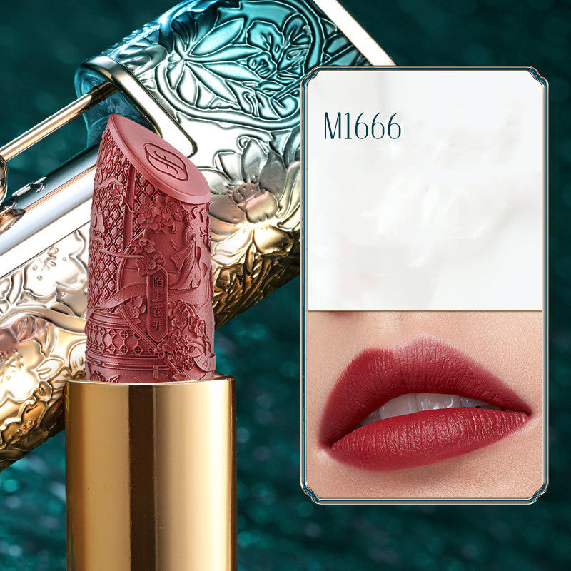 Lipstick with decorative case and color swatch on a teal background