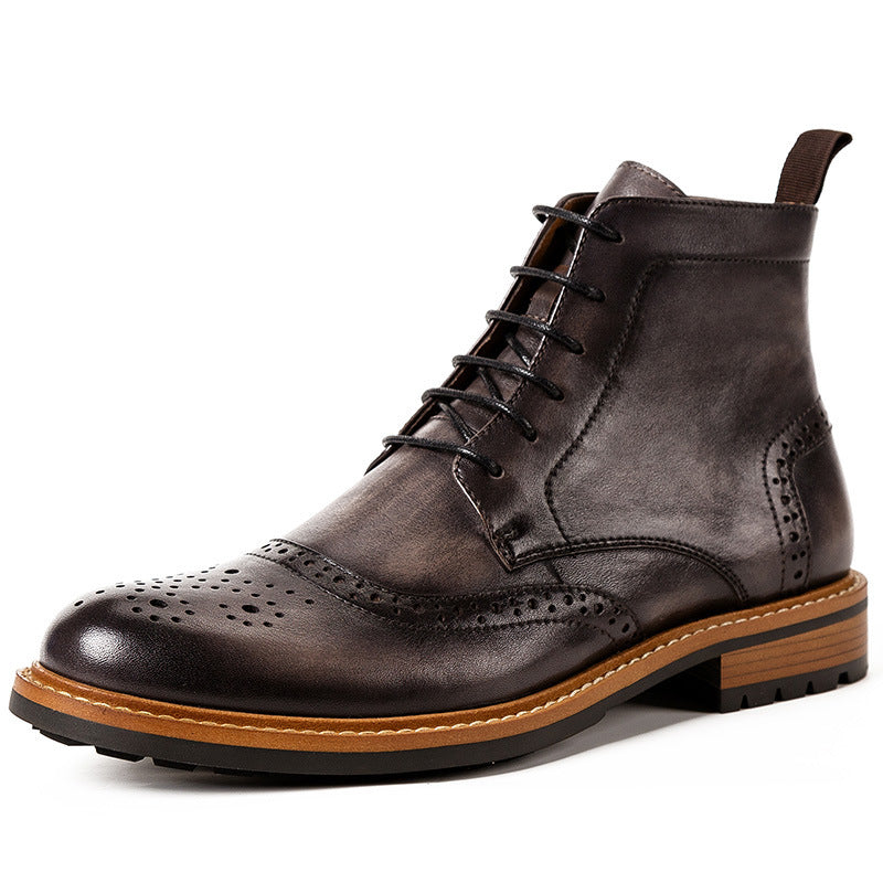 Brown leather boot with a brown sole on a white background