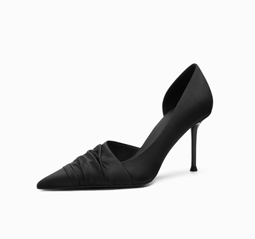 Black high-heeled shoe on a white background