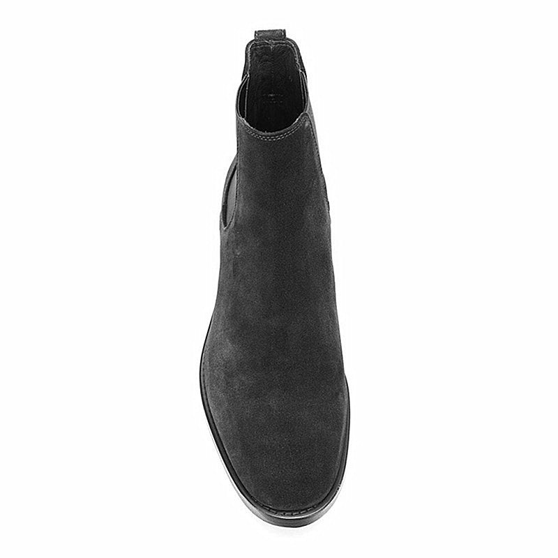 Black ankle boot on a white background