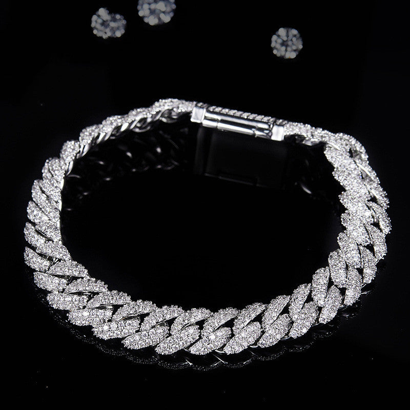 Silver chain bracelet on a black background