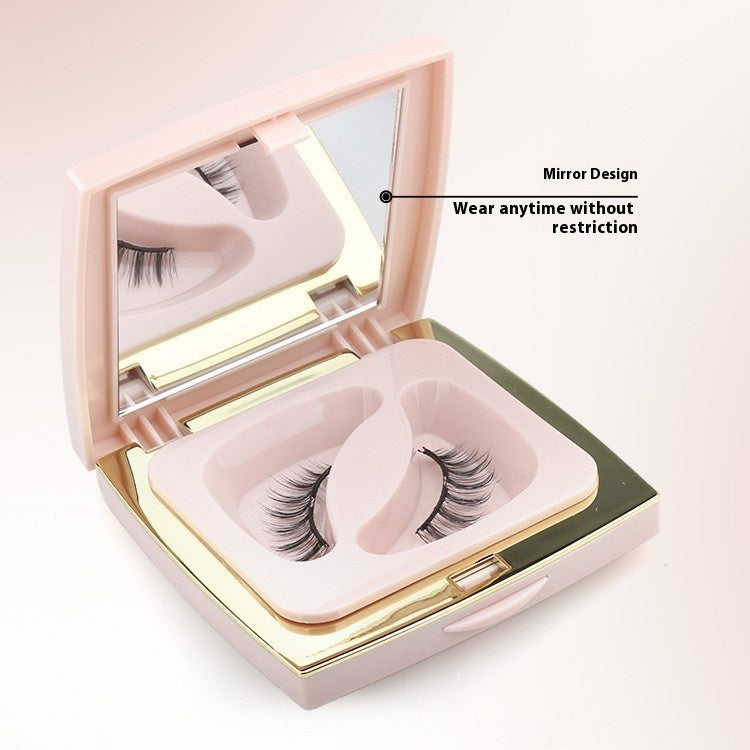 Makeup case with false eyelashes and mirror design on a white background