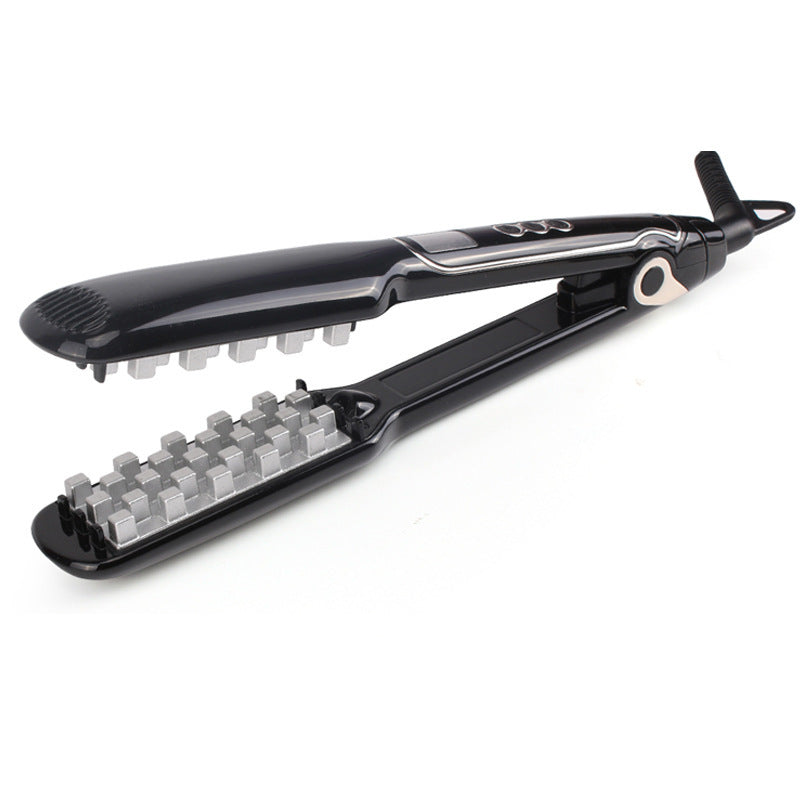 Black hair straightener with silver heating elements on a white background