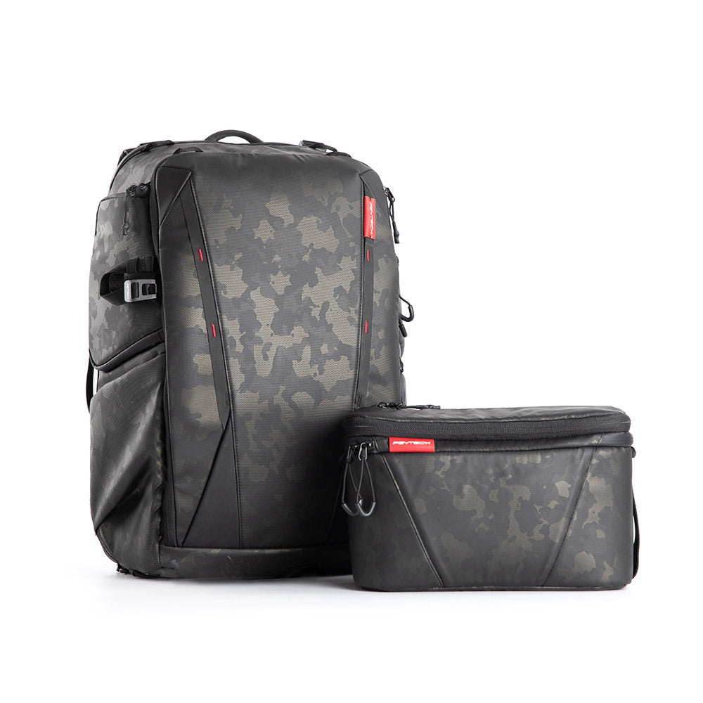 Camouflage-patterned backpack and smaller pouch on a white background