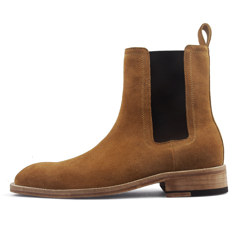 Brown suede Chelsea boot on a white background