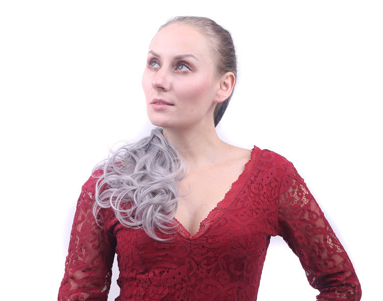 Woman wearing a red lace dress with a white background