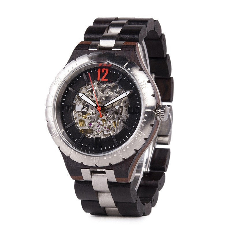 Mechanical watch with black and silver band on a white background