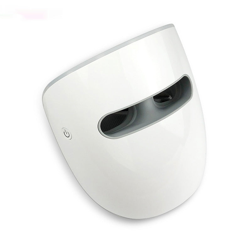 White electronic device with a power button on a white background