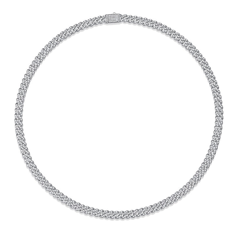 Silver necklace with clear stones on a white background