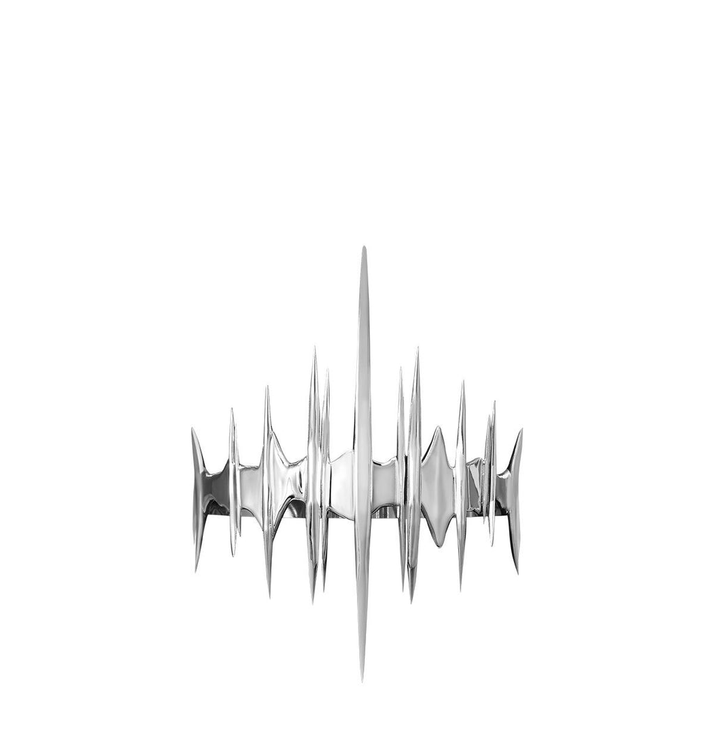 Silver wall sculpture on a white background