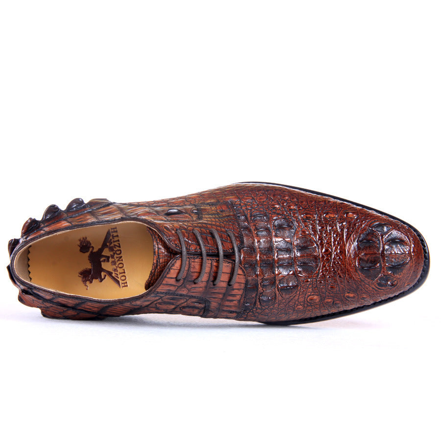 Brown crocodile-patterned shoe on a white background