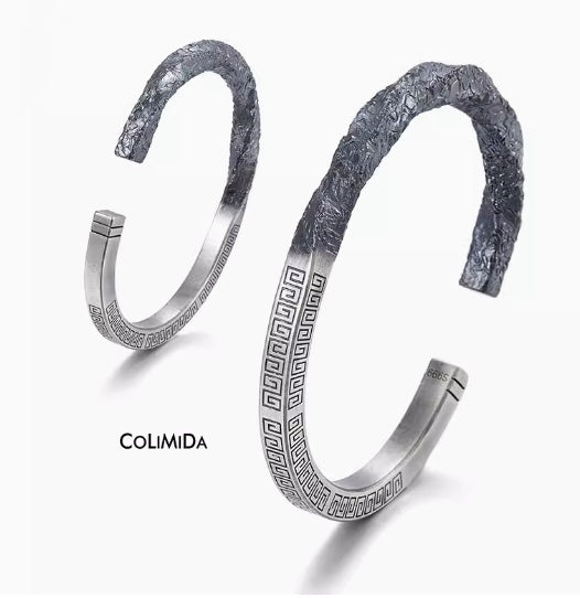 Two silver bracelets with textured design on a white background, featuring the brand 'COLIMIDA'.