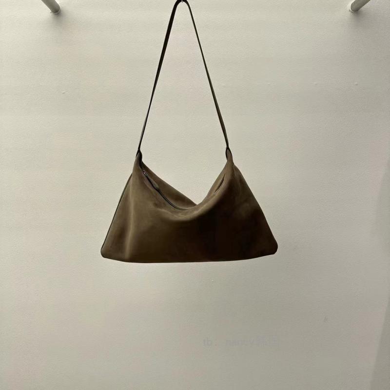 Brown shoulder bag on a white background