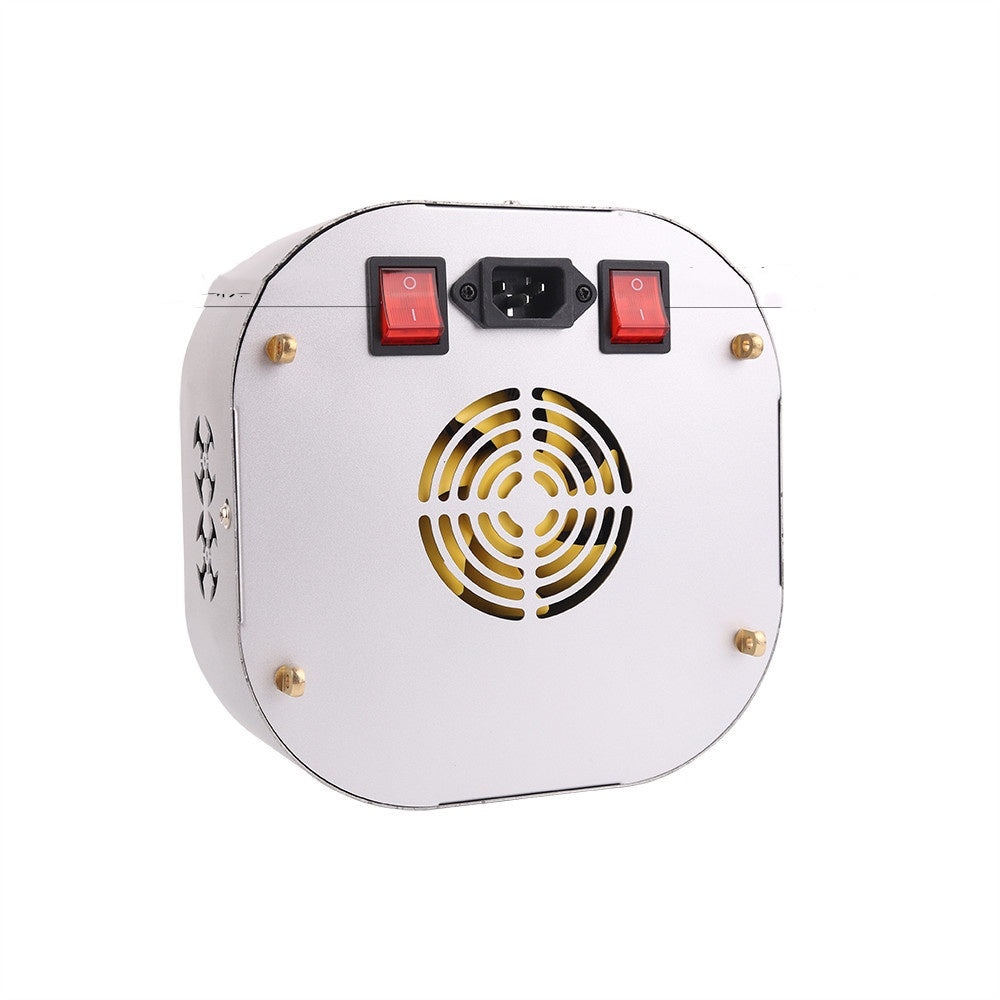 White electronic device with red switches and a power cord on a white background