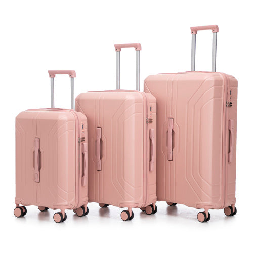 Set of three pink suitcases of different sizes on a white background