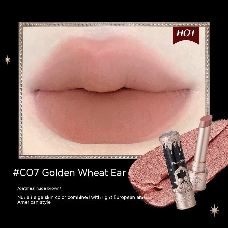Lipstick with '#CO7 Golden Wheat Ear' shade and product packaging on a black background