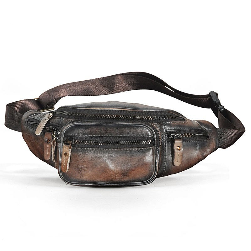 Brown leather waist bag with multiple zippers on a white background