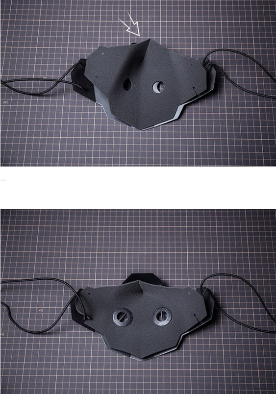 Black electronic device with wires on a grid background