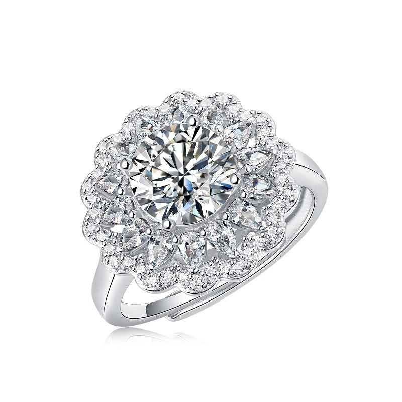 Diamond ring with floral design on a white background