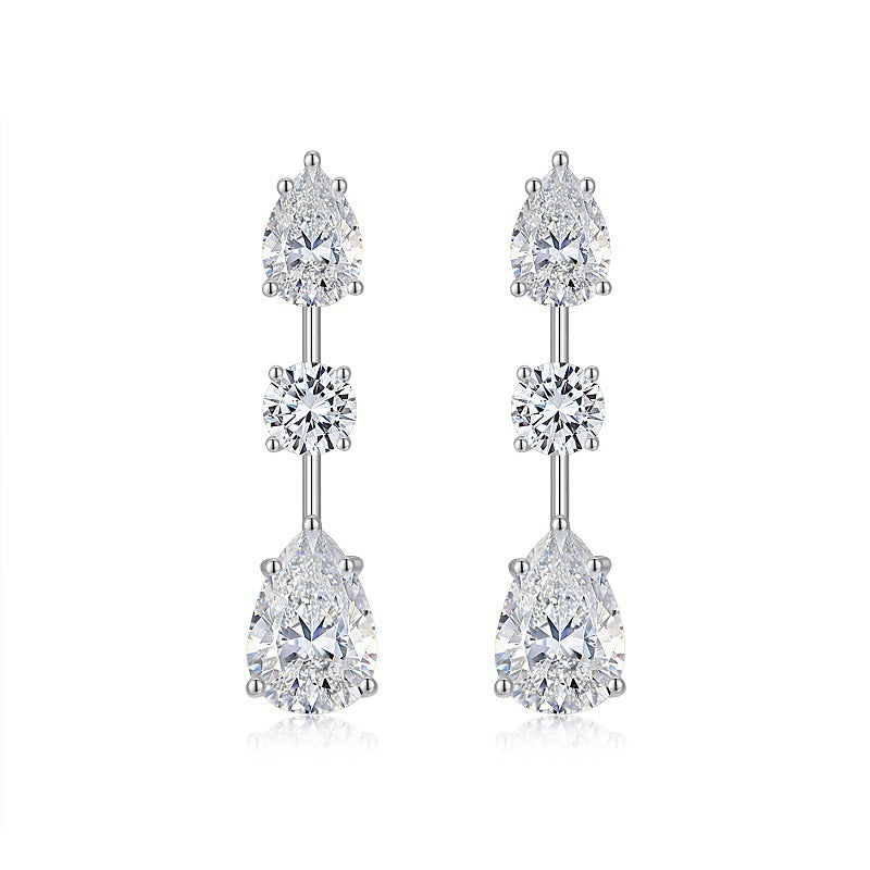 Pair of diamond earrings on a white background