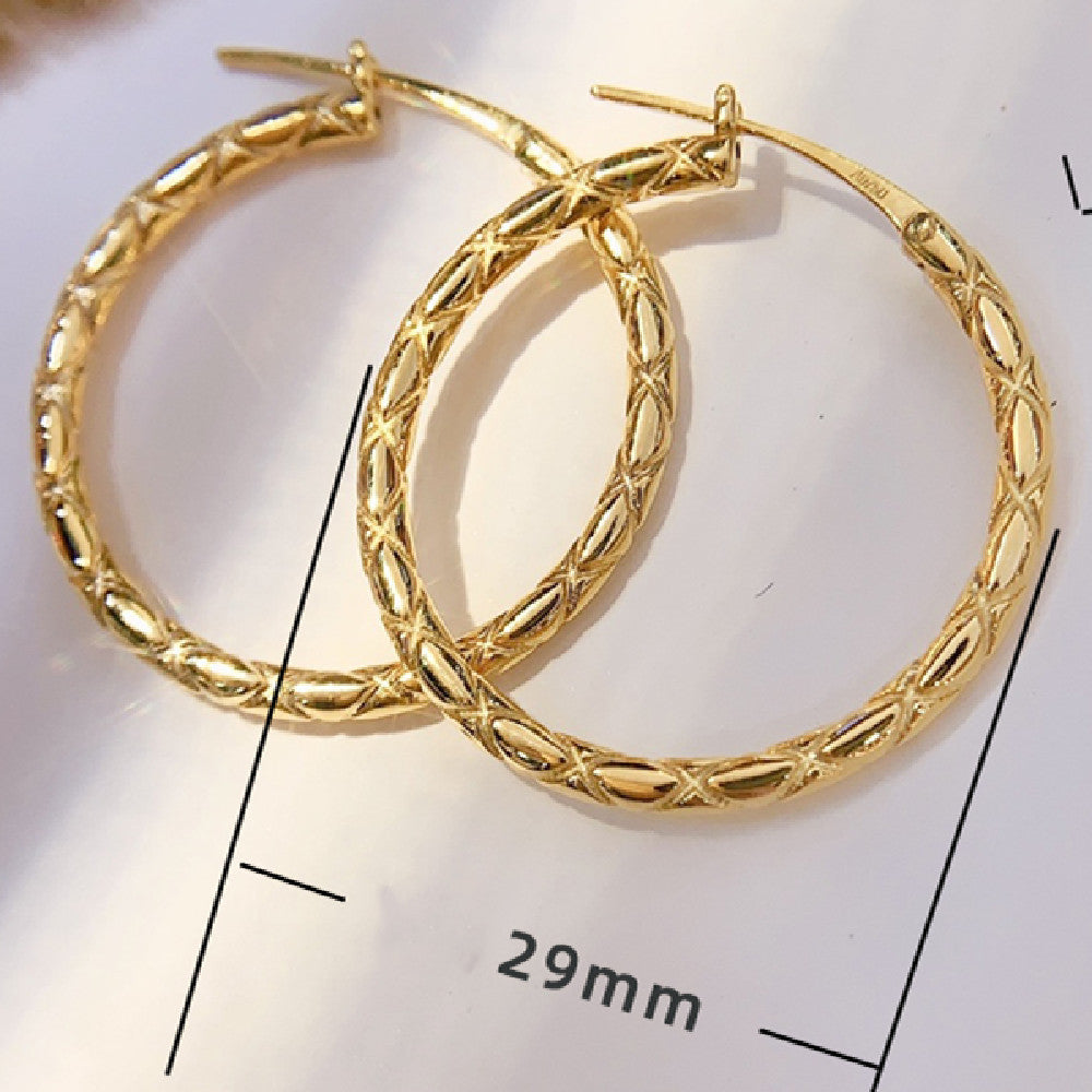 Gold hoop earrings with braided design on a white background with measurement label.