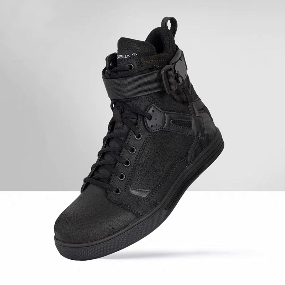 Black high-top sneaker on a light gray background