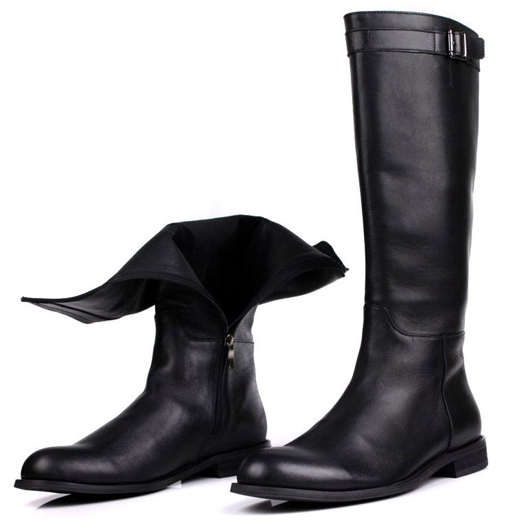 Pair of black leather knee-high boots on a white background