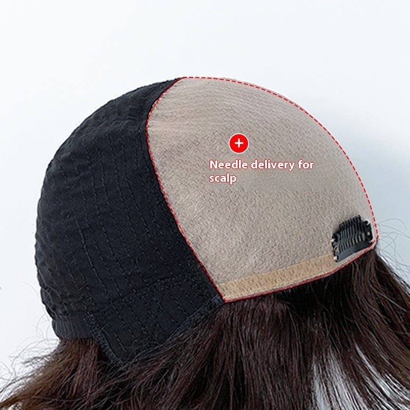Black and beige cap with needle delivery system for scalp on a white background