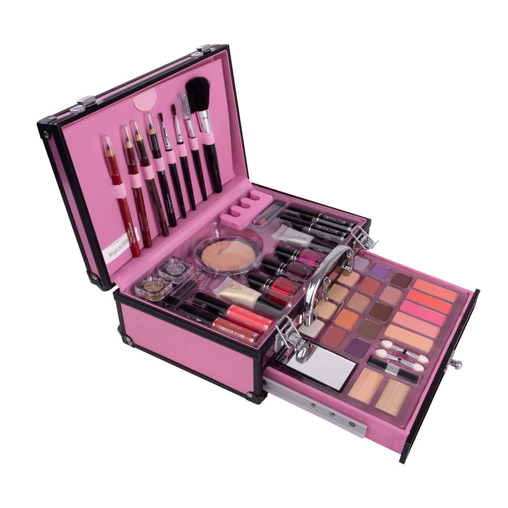 Open pink makeup case with various cosmetic items on a white background