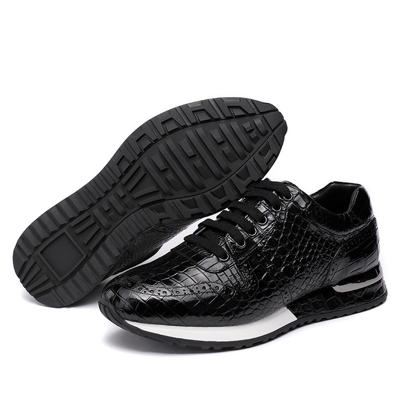 Black sneakers with textured sole on a white background