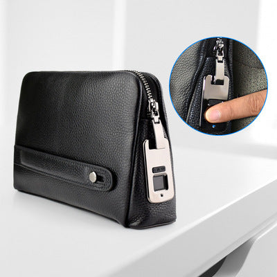 Black leather pouch with zipper on a white surface, close-up of zipper mechanism.