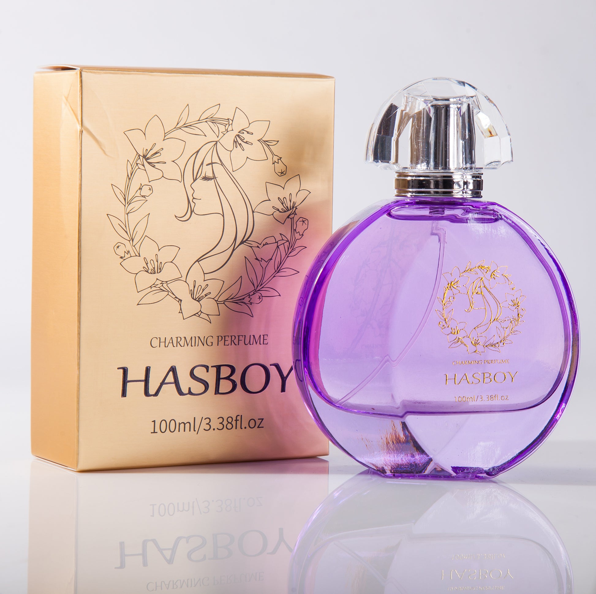 Purple perfume bottle with silver cap and gold packaging featuring a woman's face and floral design, labeled 'HASBOY'.