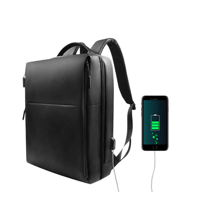 Black backpack with USB port charging a smartphone on a white background