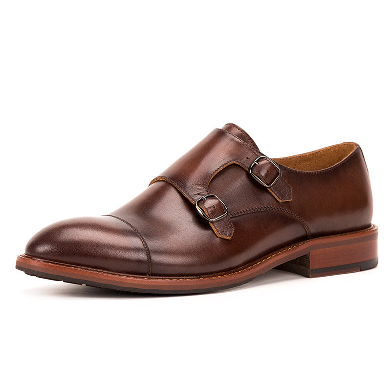 Brown leather monk strap shoe on a white background